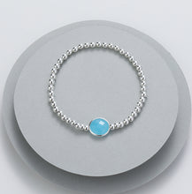 Load image into Gallery viewer, Gracee Silver Beaded Stretch Bracelet with a Blue Glass Orb