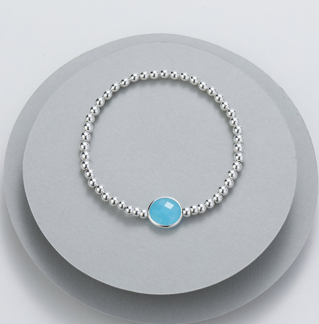 Gracee Silver Beaded Stretch Bracelet with a Blue Glass Orb