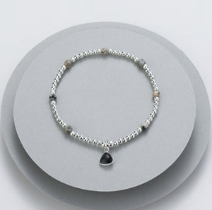 Gracee Silver Beaded Stretch Bracelet with a Black Charm